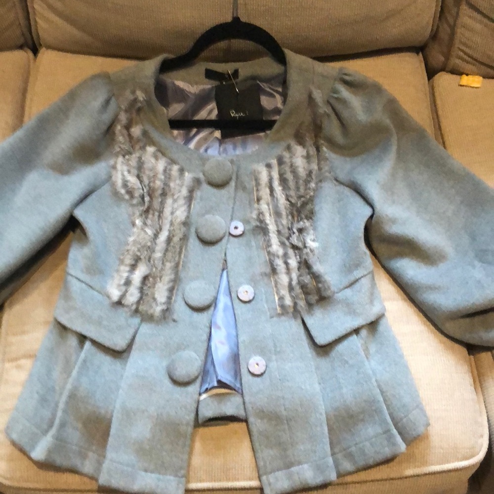 Grey short coat with “rabbit” trim.